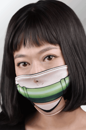 Woman wearing Nezuko Kamado bamboo muzzle-style anime face mask from Demon Slayer
