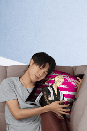 Fan hugging Draken Tokyo Revengers pillow on sofa